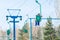 Skier climbs on the chair lift to the track