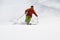 Skier in deep powder, extreme freeride