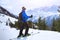 Skier enjoying beautiful view of alps mountains near Chamonix Mont Blanc, France