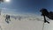 Skier enjoys idyllic perfect weather in cold winter. Skiing alone on perfectly groomed ski piste at ski resort. Shooting