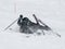 Skier fall on the ski slope.