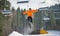 Skier flying over a hurdle in winter day