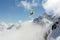 Skier jump in the mountains. Extreme ski sport. Freeride.