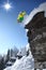 Skier jumping against blue sky