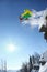 Skier jumping against blue sky