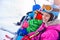 Skier kids on ski lift