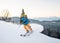 Skier man in snow powder produces braking on the slope of mountain