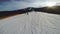 Skier on piste in high mountains