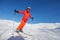 Skier is posing at camera at Gudauri resort in high mountaing of