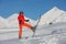 Skier is posing at camera at Gudauri resort in high mountaing of Georgia