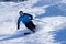 A skier in powder snow