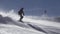 Skier Raises a lot of Snow Dust. Slow Motion