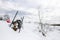 Skier relaxing on bench after a long hike