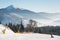 Skier riding in the mountains on a sunny winter day