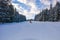 Skier running down the slope in Karakol mountains.