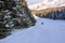 Skier running down the slope in Karakol mountains.