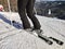 Skier on the ski slope. View of a skier overlooking a snowy slope. Turning on skis.