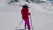 Skier Skiing Down On Mountain Slope In Winter And Brake Skis To Stop