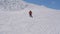 Skier Skiing Down The Slope In The Mountains Carving Turns Splash Snow