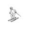 Skier skiing downhill hand drawn outline doodle icon.