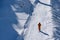 Skier skiing high mountains in fresh powder snow, Mt. Titlis, Switzerland