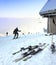 Skier and skis on a ski slope