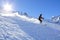 Skier speeding down the mountain in a sunny day in Spain