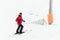 Skier stands near the fence under chair lift