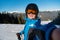 Skier taking a selfie in the mountains