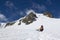 Skier about to jump in a mountain