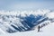 Skier traversing backcountry over the Asulkan Valley and Rogers Pass area of Glacier National Park, Canada