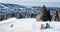 Skiers admiring the view of mountain in Kopaonik winter ski resort  Serbia