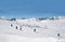 Skiers on Alpine ski slope