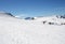 Skiers on Alpine ski slope