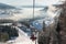 Skiers on cable car in Bukovel with an ideal landscape