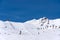 Skiers and chairlift in Solden, Austria