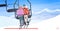Skiers couple in cable car man woman sitting together live streaming blogging concept cable-way in snowy mountains