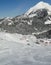 Skiers descend to tiny mountain village