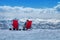 Skiers enjoy in sunbed after skiing on top of a mountain, Alps, Switzerland