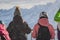 Skiers enjoying a mountain view