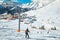 Skiers exercising on the slope and ski lifts, France, Europe