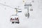 Skiers go on the lift on mountain in Bansko, BG