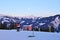 Skiers and mountain scenery on the Areit cable car station. Zell am See, Austria.