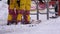 Skiers Pass a Turnstile Gates of Ski Lift. The Entrance of a Ski Chair Lifts with Skiers. Slow Motion