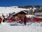 Skiers relax in the sun