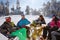 Skiers resting from skiing in cafe on ski terrain
