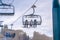 Skiers on ski lifts against sky in Park City Utah