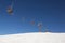 Skiers on ski lifts in Val Gardena Ski resort, Sellaronda