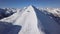 Skiers on ski slope in Obertauern aerial