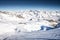 Skiers skiing on the top of Presena Glacier, Tonale, Italy